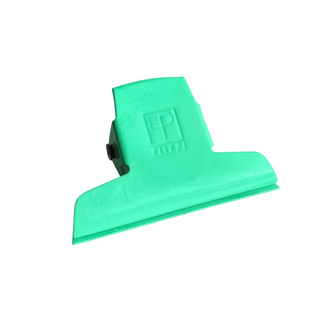 Green clip on a white background