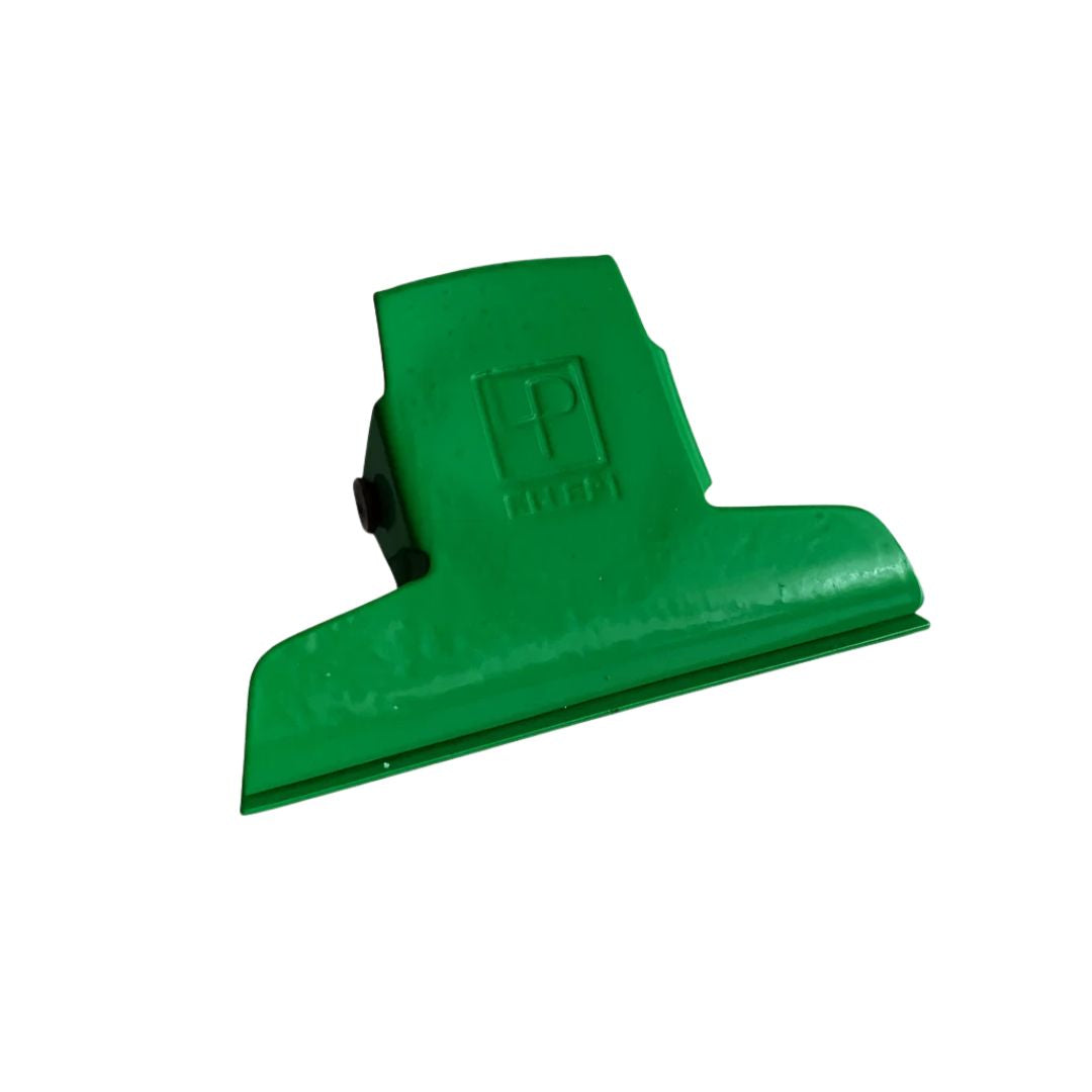 Green clip on a white background