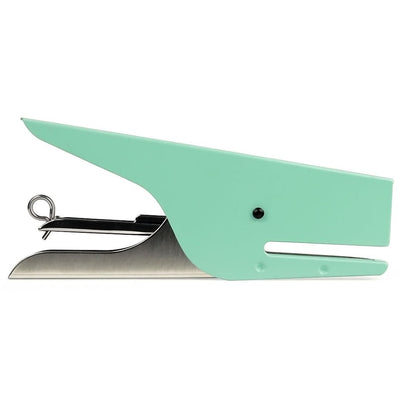 Mint green stapler on a white background